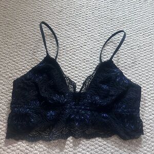 Adorable gothic black lace bralette with a pearlescent blue embroidery